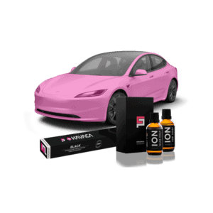 a pink car with black boxes and bottles